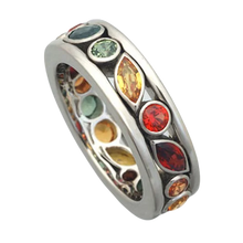 Ring with multicolored gemstones on a white background