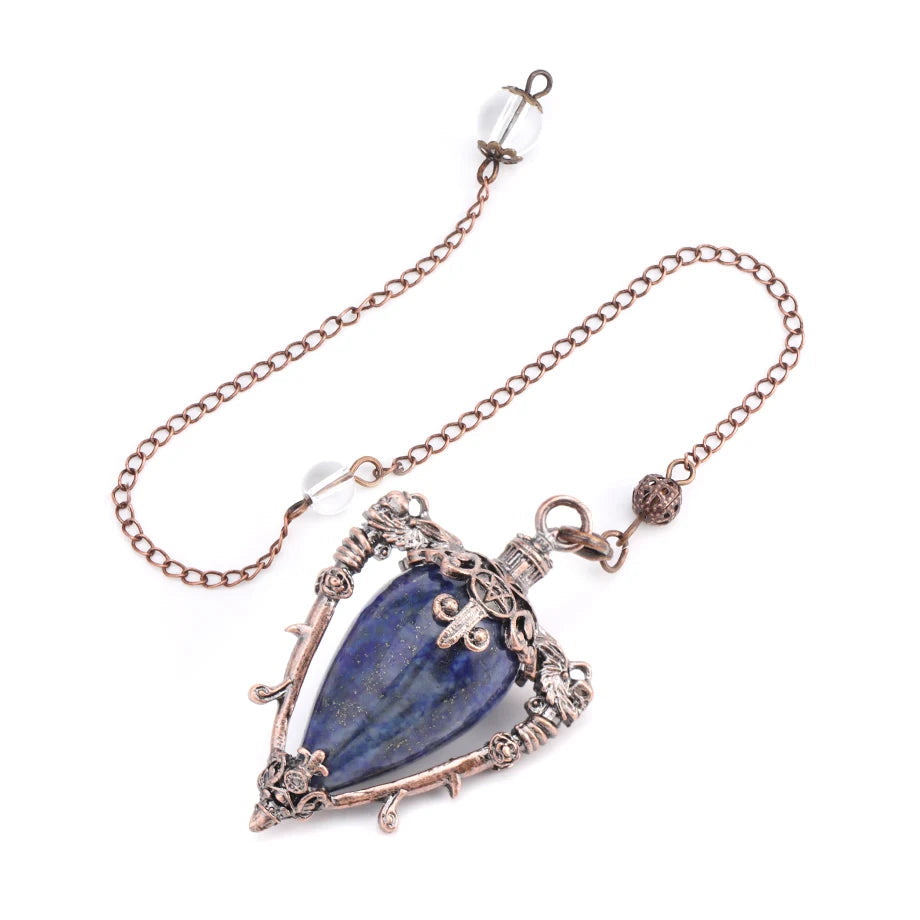 Necklace with blue stone pendant and rose gold chain on a white background