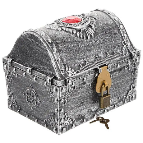 Decorative treasure chest with a lock and red gemstone on a white background