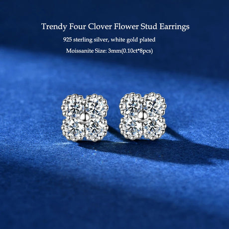 Trendy four clover flower stud earrings on a blue background