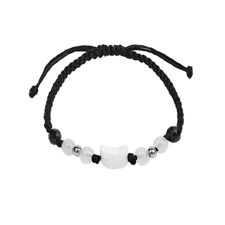 Black braided bracelet with white and silver beads on a white background