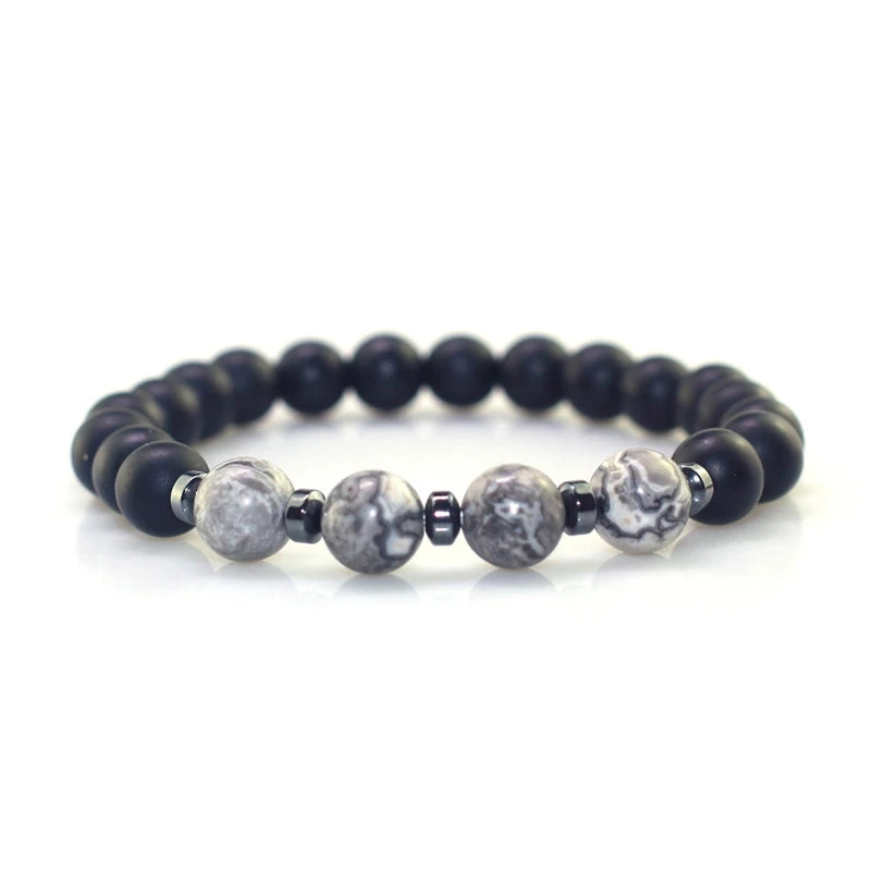 Black and gray beaded bracelet on a white background