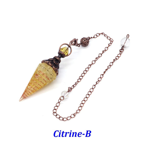 Citrine-colored pendant with chain on a white background
