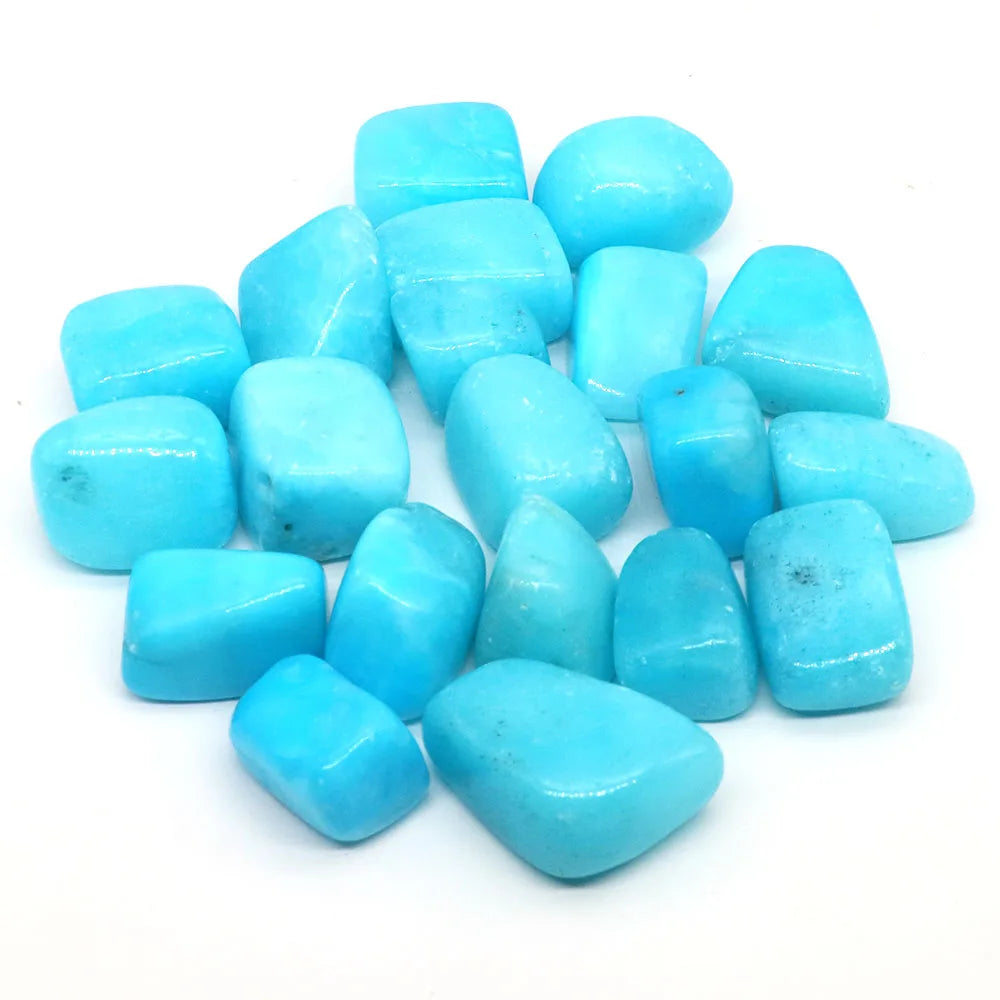 Turquoise stones on a white background