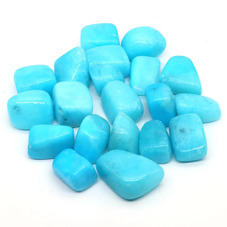 Turquoise stones on a white background