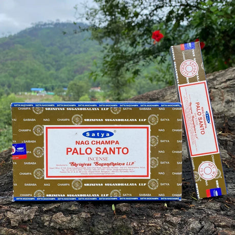 Satya Nag Champa Palo Santo incense packaging on a natural background