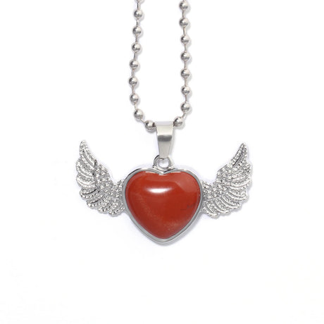 Necklace with a red heart pendant and silver wings on a white background