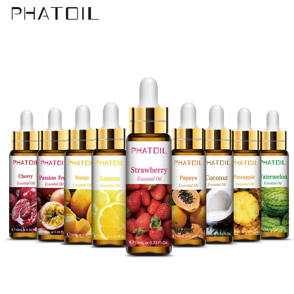 Assorted PHATOIL essential oil dropper bottles with fruit-themed labels on a white background