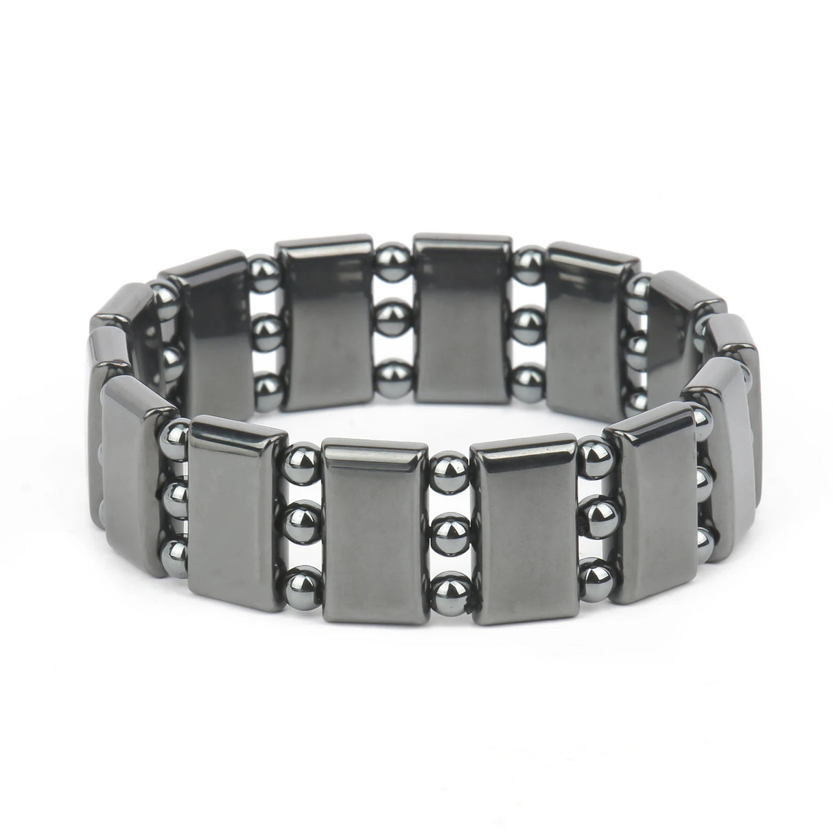 Silver bracelet with rectangular links and beads on a white background