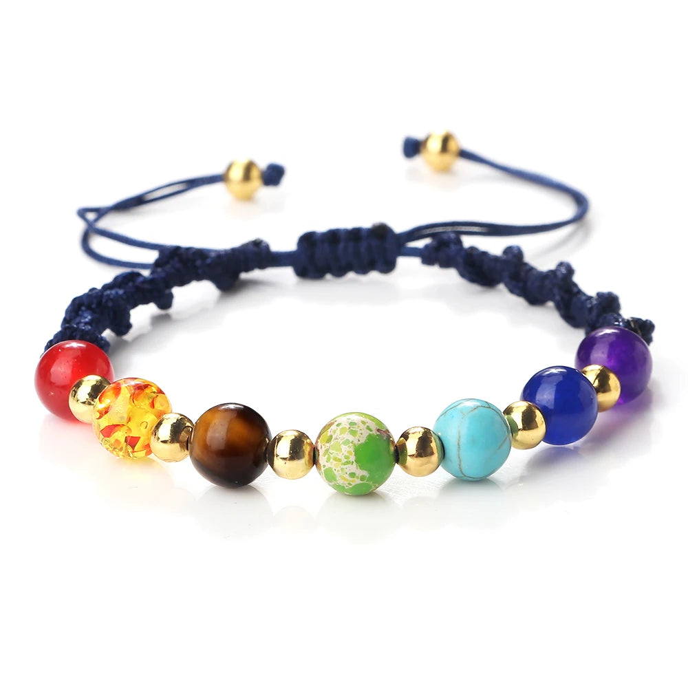 Colorful beaded bracelet with various beads on a white background