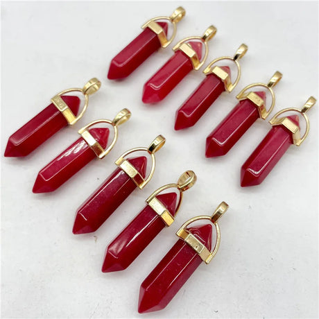 Red crystal pendants with gold accents on a white background