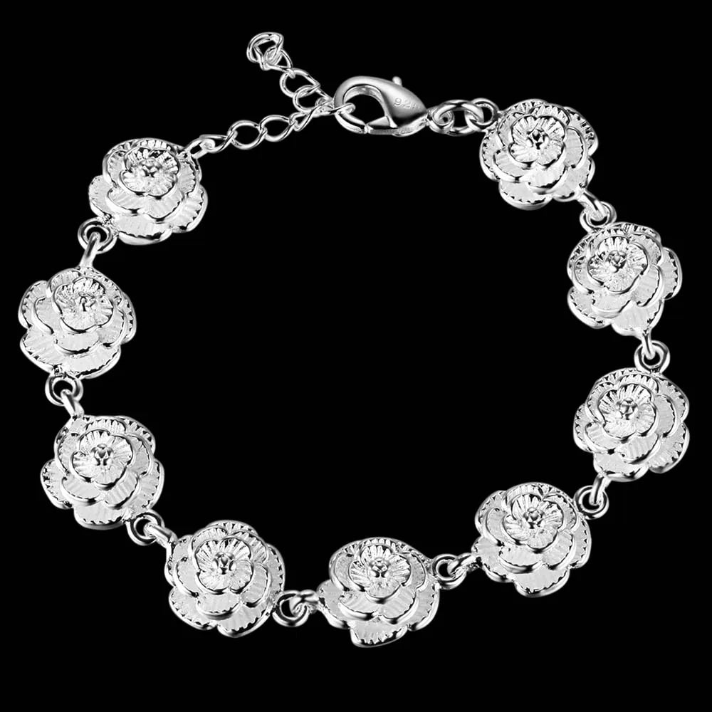 Silver rose-shaped bracelet on a black background