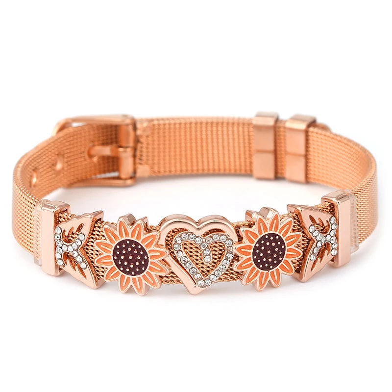 Rose gold dog collar with sunflower and heart designs on a white background