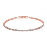 Rose gold bracelet with clear stones on a white background, branded 'MEEKCAT'.
