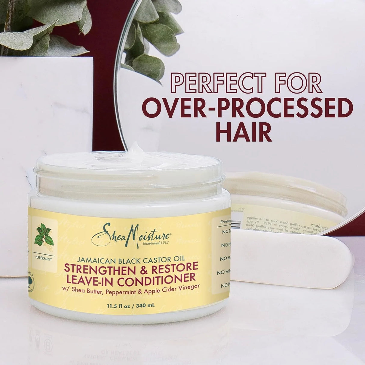 SheaMoisture leave-in conditioner jar with text 'Perfect for over-processed hair' on a white background