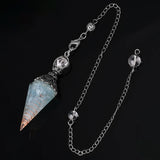 Crystal cone with chain on a black background