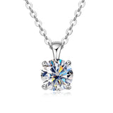 Silver necklace with a round diamond pendant on a white background