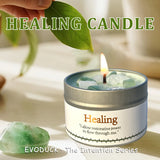 Healing candle with green leaf and crystal on a light background, featuring the brand 'EVODUCK'.