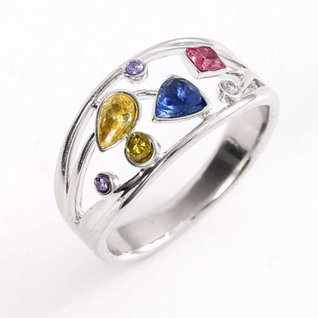 Silver ring with colorful gemstones on a white background