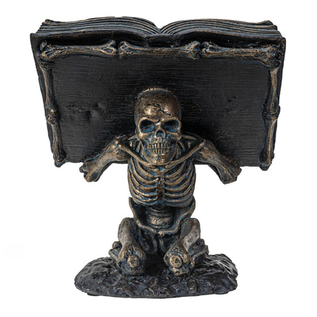 Skeleton holding Spell Book