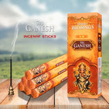 Sri Ganesh incense sticks with packaging on a wooden surface and scenic background