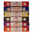 Stack of Nag Champa incense boxes in various colors with different incense names.