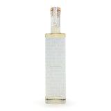 Clear bottle with marble pattern and wooden cap on a white background