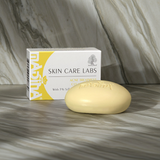 Acne treatment cleansing soap bar presented for bathing and personal skincare routines.