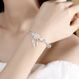 Silver Dreamcatcher Charm adjustable bracelet for wrist styling, everyday outfits, and bohemian jewelry wear.
