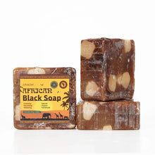 African Black Soap with Organic Shea Butter bars with packaging on white background for face and body cleansing.