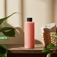 African Fantasy unisex fragrance body oil bottle for hydrating skin, adding a light scent, and routine body care.