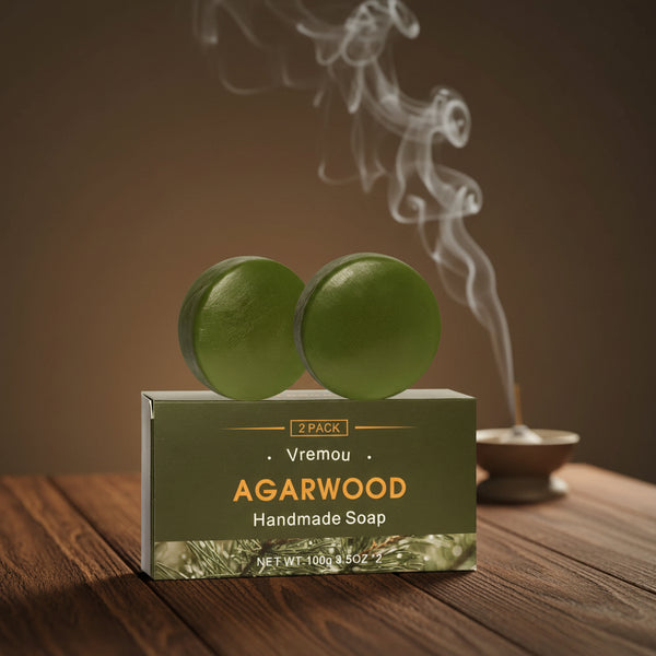 2-Pack Handmade Agarwood and Sandalwood Soap bars on branded box for grounding daily cleansing.