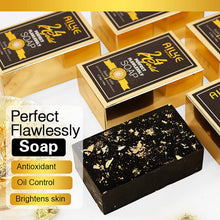 AILKE 24K Gold Collagen Whitening Soap bar with black and gold packaging on white background.