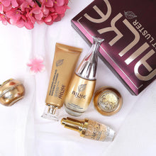 AILKE Collagen Whitening Face Cream Set bottle tube and box with pink flowers on white background.