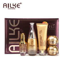 AILKE Collagen Whitening Face Cream Set bottles and box product display on white background.