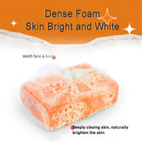 AILKE Handmade Organic Papaya Whitening Soap dense foam lather for face and body on orange background.