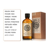 Akarz essential oil bottle and box with language translations on a white background