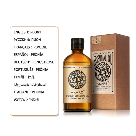 Akarz essential oil bottle and box with language translations on a white background