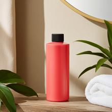 Almond Body Oil unisex body oil bottle for after-shower moisturizing, locking in hydration, and body smoothing care.