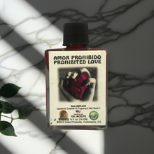 Amor Prohibido love wish ritual oil bottle for passion prayers, relationship intention work, and spiritual use.
