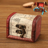 Antique-look handmade wooden jewelry box for organizing earrings, bracelets, and sentimental accessories at home.
