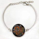 Artisan Reiki steampunk glass pendant for healing sessions, spiritual gifting, and boho accessory styling.