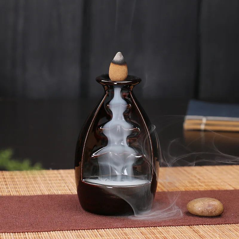 Ceramic backflow incense and aromatherapy burner for creating a calming aroma, meditation, and home decor use.