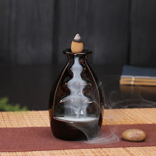 Ceramic backflow incense and aromatherapy burner for creating a calming aroma, meditation, and home decor use.