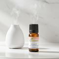 Basil Essential Oil glass bottle for aromatherapy diffusers, focus-enhancing blends, and fresh herbal home fragrance.
