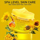 Bee Venom Neck and Face Cream yellow jar surrounded by sunflowers on yellow background.
