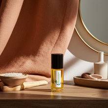 Belizean Breeze moisturizing body oil bottle for smoothing skin, locking in moisture, and everyday body care.
