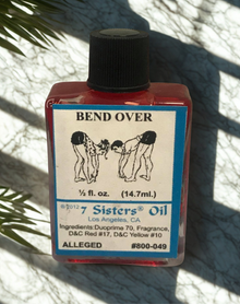 Bend Over Wish Oil spiritual oil bottle for wish manifestation, altar work, and ceremonial use.
