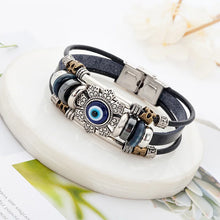Black leather Evil Eye bracelet men’s jewelry piece for daily wear, layered wrist styling, and protective fashion use.