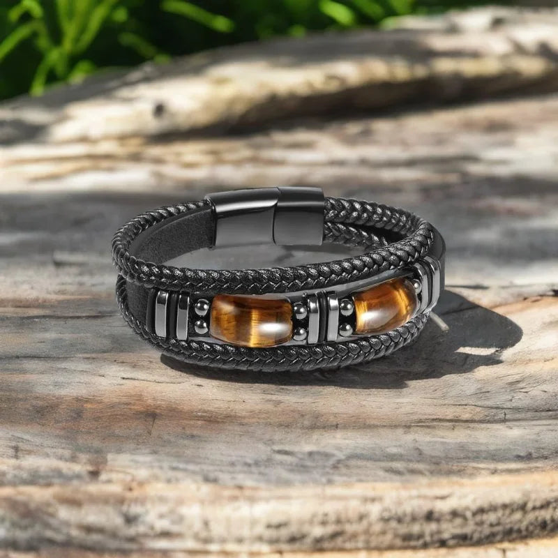 Black leather Tiger Eye bracelet for men with braided band and stone detail for casual outfits, office wear, and everyday accessorizing.